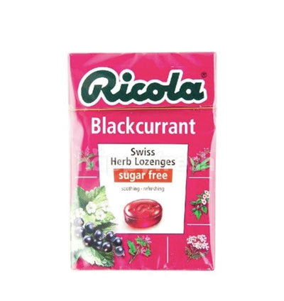 Ricola Blackcurrant - sugar free vegan lozenges with 13 Swiss mountain herbs for soothing relief. Perfect for on-the-go.