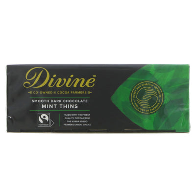 Fairtrade & vegan dark chocolate mint thins by Divine. Enjoy these delicious treats guilt-free. Perfect for snacking or adding to recipes.