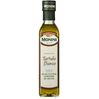 Indulge in the exquisite taste of Monini's White Truffle Flavoured Oil. Made with extra virgin olive oil, this gluten-free & vegan condiment adds a touch of luxury to your dishes. Drizzle it over pasta, risotto, or roasted vegetables for a truly gourmet experience. Elevate your culinary creations with this aromatic delight.